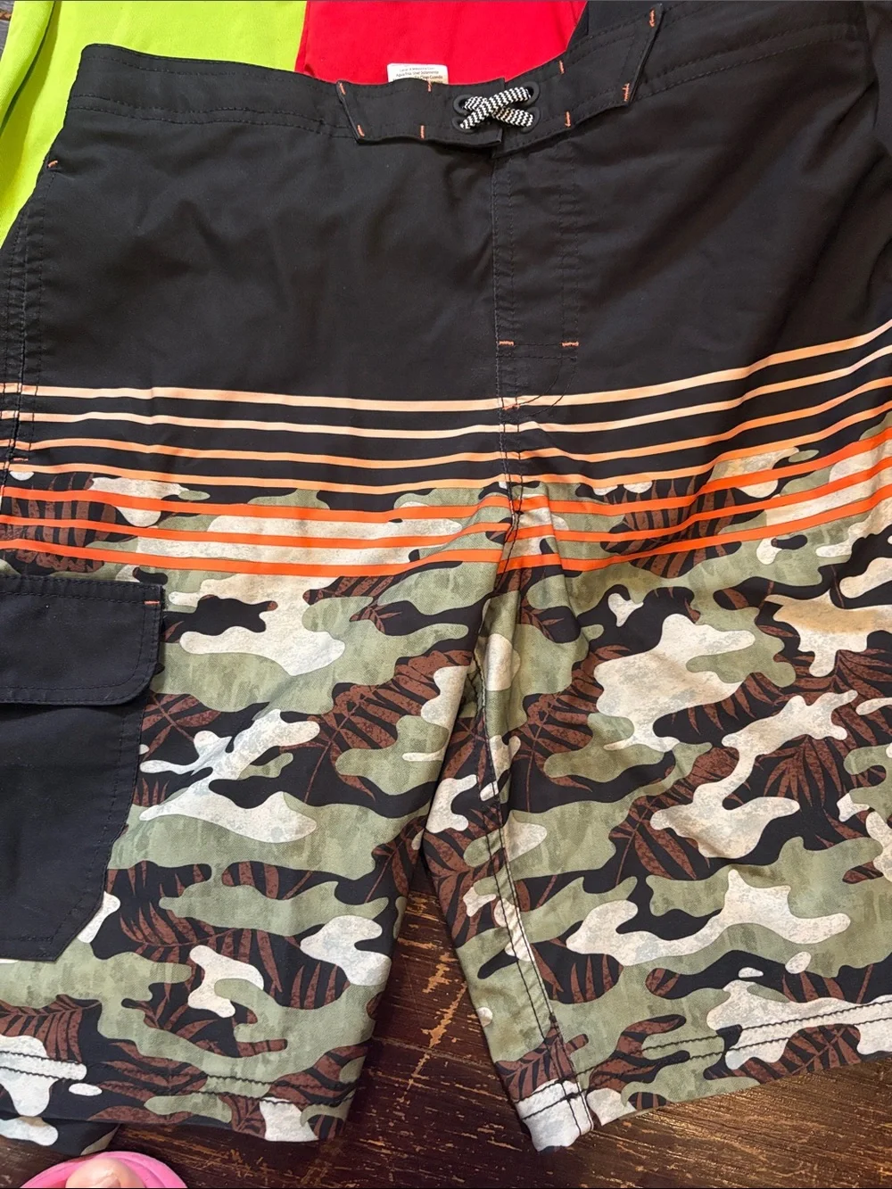 Boys size 14/16 swim lot. 1 swim trunk, 4 shirts